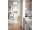 Modern kitchen with white cabinets and built-in coffee bar at 731 Belt Se Loop, Atlanta, GA 30316