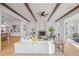 Bright and airy living room with white sofa and fireplace at 731 Belt Se Loop, Atlanta, GA 30316