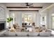 Spacious living room with hardwood floors, white walls, and a fireplace at 731 Belt Se Loop, Atlanta, GA 30316
