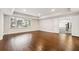 Finished basement boasts hardwood floors and large windows at 100 Dunwoody Creek Ct, Atlanta, GA 30350