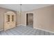 Dining room with tile floors, chandelier, and built-in hutch at 2773 Parcel Rd, Austell, GA 30106