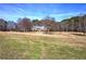 Single-story house on a large lot with trees and driveway at 857 Garner Rd, Rockmart, GA 30153