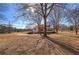 House with a large backyard and mature trees at 857 Garner Rd, Rockmart, GA 30153
