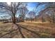 House with a large backyard and mature trees at 857 Garner Rd, Rockmart, GA 30153