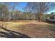 Large backyard with mature trees and open space at 857 Garner Rd, Rockmart, GA 30153