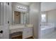 Bathroom with a garden tub and updated vanity at 857 Garner Rd, Rockmart, GA 30153