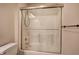 Bathroom with shower/tub combo and sliding glass door at 857 Garner Rd, Rockmart, GA 30153