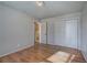 Bedroom with hardwood floors and access to bathroom at 857 Garner Rd, Rockmart, GA 30153