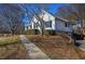 Side view of a white single-story house with attached garage at 857 Garner Rd, Rockmart, GA 30153