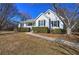 White single story house with a gray roof, and walkway at 857 Garner Rd, Rockmart, GA 30153