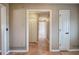 View down a hallway with doors at 857 Garner Rd, Rockmart, GA 30153