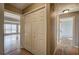 Bright hallway with hardwood floors and linen closet at 857 Garner Rd, Rockmart, GA 30153