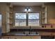 Kitchen with granite countertops, double sink and open shelving at 857 Garner Rd, Rockmart, GA 30153