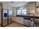 Modern kitchen featuring stainless steel appliances and hardwood floors at 857 Garner Rd, Rockmart, GA 30153