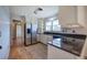 Spacious kitchen with stainless steel appliances and granite countertops at 857 Garner Rd, Rockmart, GA 30153