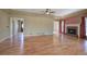 Spacious living room with hardwood floors, fireplace, and access to foyer at 857 Garner Rd, Rockmart, GA 30153