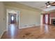 Open living room with hardwood floors, high ceilings and access to the foyer at 857 Garner Rd, Rockmart, GA 30153