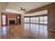Spacious living room with hardwood floors, fireplace, and abundant natural light at 857 Garner Rd, Rockmart, GA 30153