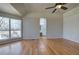 Large main bedroom with hardwood floors and ensuite bathroom at 857 Garner Rd, Rockmart, GA 30153