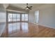 Spacious main bedroom with hardwood floors and large windows at 857 Garner Rd, Rockmart, GA 30153