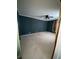 Spacious bedroom with dark walls and carpeted floors at 6050 Ledgewood Dr, Forest Park, GA 30297