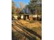 Brick ranch house with a large yard at 6050 Ledgewood Dr, Forest Park, GA 30297