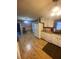 Kitchen with white cabinets and hardwood floors at 6050 Ledgewood Dr, Forest Park, GA 30297