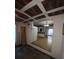 Open sunroom area with wood floors and brick walls at 6050 Ledgewood Dr, Forest Park, GA 30297