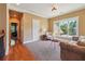 Spacious bonus room with window seating and hardwood floors at 15 Amberly Ln, Cartersville, GA 30121