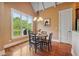 Bright breakfast nook with wooden table and view of backyard at 15 Amberly Ln, Cartersville, GA 30121