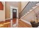 Hardwood floors and a dramatic staircase highlight this two-story entryway at 15 Amberly Ln, Cartersville, GA 30121