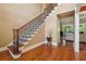 Elegant entryway with hardwood floors, a grand staircase, and high ceilings at 15 Amberly Ln, Cartersville, GA 30121