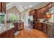 Modern kitchen with granite countertops and stainless steel appliances at 15 Amberly Ln, Cartersville, GA 30121
