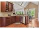 Large kitchen with granite countertops and ample cabinet space at 15 Amberly Ln, Cartersville, GA 30121