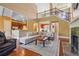 Open living space with hardwood floors, a stone fireplace, and a sectional sofa at 15 Amberly Ln, Cartersville, GA 30121