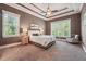 Main bedroom with high ceilings, large windows, and plush carpeting at 15 Amberly Ln, Cartersville, GA 30121