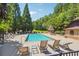 Community pool with lounge chairs and nearby cabana at 15 Amberly Ln, Cartersville, GA 30121