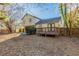 House backyard with deck and trees at 2522 Corner Shoals Dr, Decatur, GA 30034