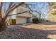 House backyard with deck and trees at 2522 Corner Shoals Dr, Decatur, GA 30034