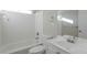 Clean bathroom with white tile and vanity at 2522 Corner Shoals Dr, Decatur, GA 30034