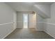 Spacious bedroom with neutral walls and carpeting at 2522 Corner Shoals Dr, Decatur, GA 30034