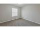 Bright bedroom with neutral walls and carpet at 2522 Corner Shoals Dr, Decatur, GA 30034