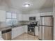 Updated kitchen, granite countertops, stainless steel appliances at 2522 Corner Shoals Dr, Decatur, GA 30034