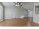 Spacious living room with hardwood floors, large windows and ceiling fan at 2522 Corner Shoals Dr, Decatur, GA 30034