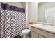 Clean bathroom with shower/tub combo and vanity at 3811 River Rock Rd, Lithonia, GA 30038