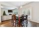 Breakfast area with a table and chairs, open to the kitchen at 3811 River Rock Rd, Lithonia, GA 30038