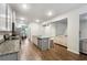 Open concept kitchen with granite countertops and stainless steel appliances at 3811 River Rock Rd, Lithonia, GA 30038