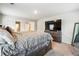 Main bedroom with a comfortable king bed and dresser at 3811 River Rock Rd, Lithonia, GA 30038