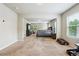 Large main bedroom with ample space and plush carpet at 3811 River Rock Rd, Lithonia, GA 30038