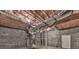 Unfinished basement with HVAC and plumbing at 445 Milton Dr, Canton, GA 30114